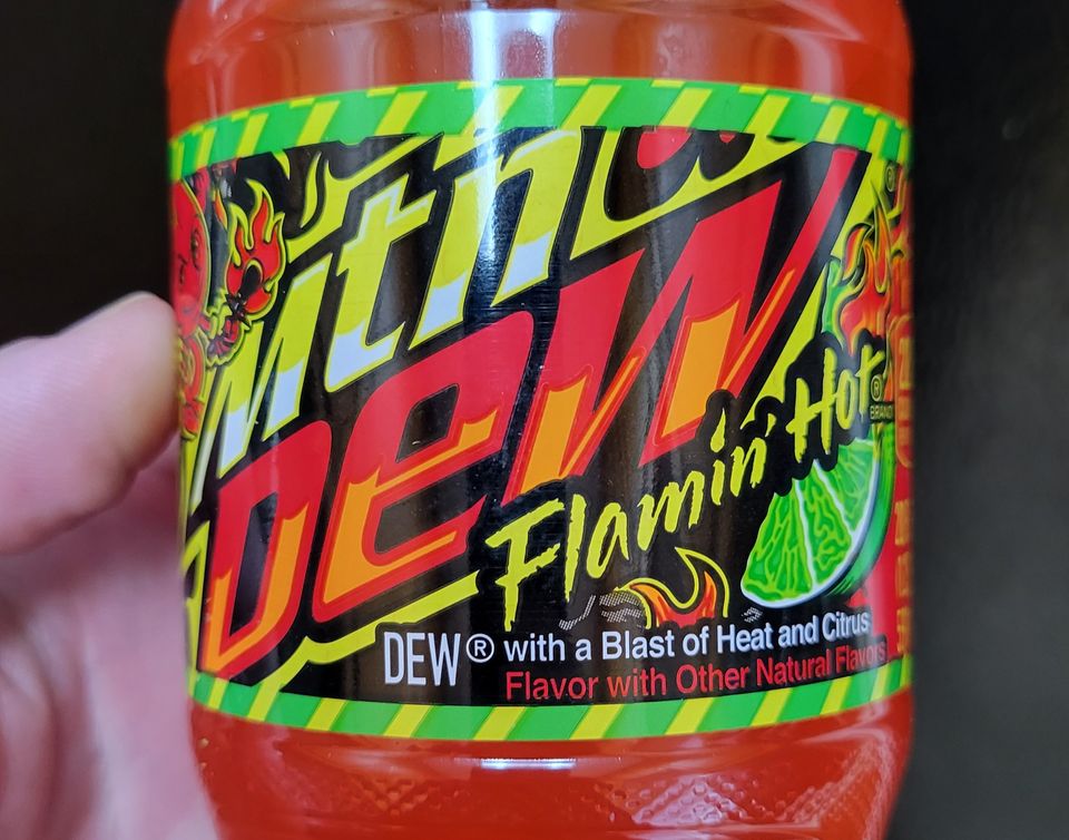 Image of the label of a 20oz bottle of Flamin' Hot flavor Mountain Dew
